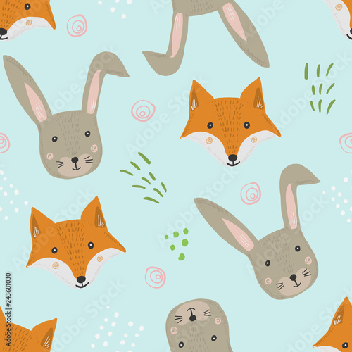 Cute seamless pattern with cartoon orange fox and gray hare heads with grass on blue background. Funny hand drawn foxy and rabbit texture for kids design, wallpaper, textile, wrapping paper