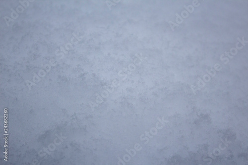 background of fresh snow texture in dark grey color abstract texture in winter season