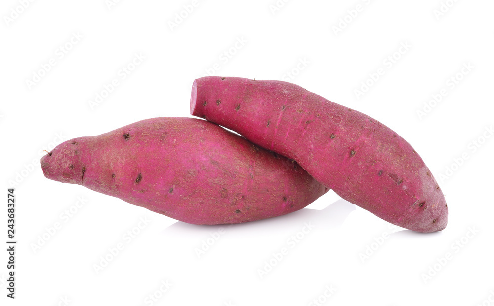 whole fresh Japanese sweet potatoes on white background