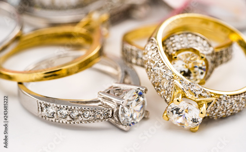 Engagement diamond wedding ring group on white background, diamond, golden rings