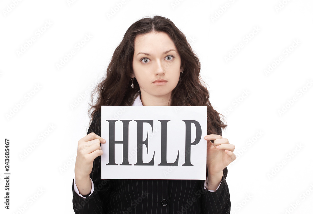 young business woman holding a poster that says HELP. young business woman holding a poster that says HELP.