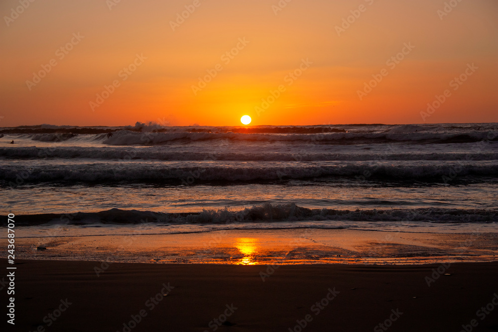 sunset on the sea coast as a background