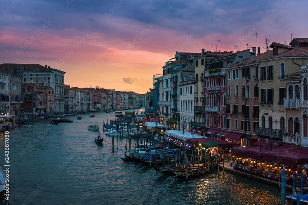 Amazing view of Grand Canal with gondolas at sunset. Venice, Italy