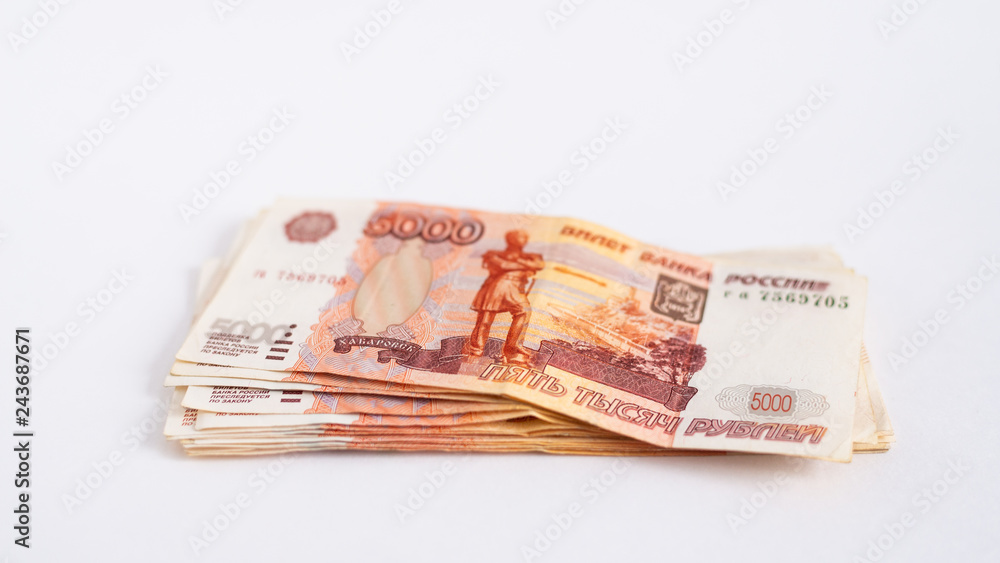 A stack of Russian banknotes on white background. 5000 rubles A stack of Russian banknotes on white background. 5000 rubles