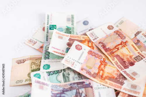 Heap of russian money, rubel banknotes on white background. Loan, mortgage, credit concept