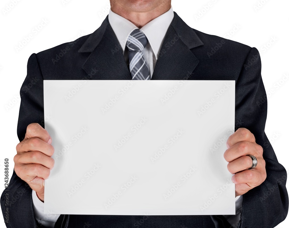 Businessman Holding a White Paper Sheet Businessman Holding a White Paper Sheet