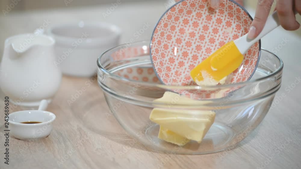 Homemade baking with the grunge auto hand mixer and ingredients of sugar and butter. Homemade baking with the grunge auto hand mixer and ingredients of sugar and butter.