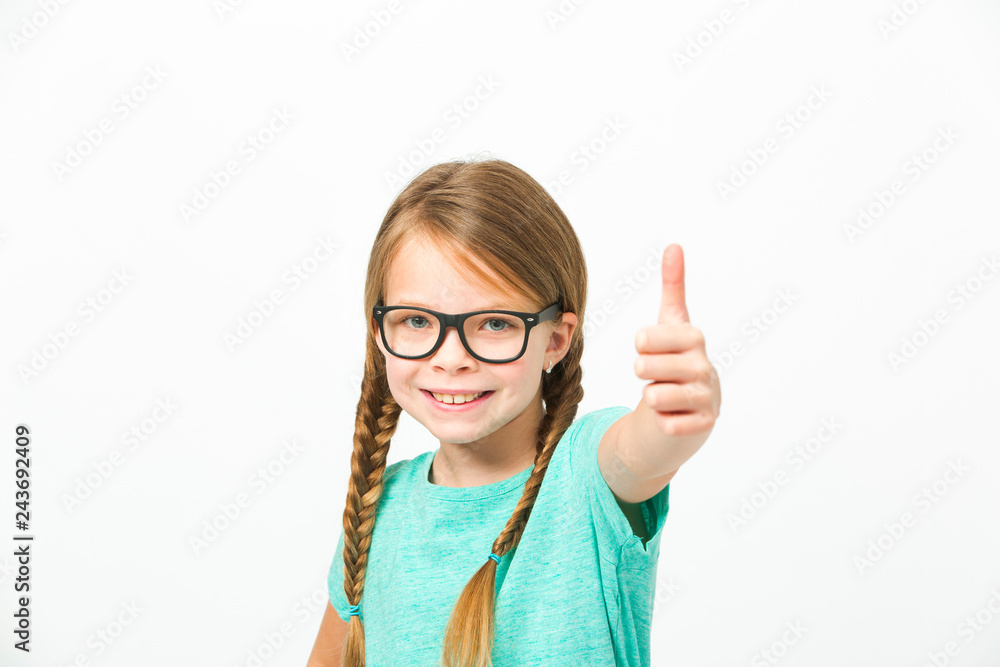 pretty girl with black glasses and plaits in front of white background in the studio pretty girl with black glasses and plaits in front of white background in the studio