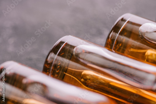 Canvas Print close up of bottles with cbd oil on grey background