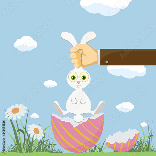 Easter egg and cute bunny. Festive background with meadow and flowers.