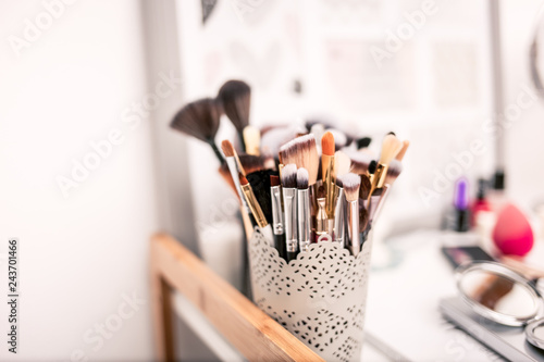 Make-up brushes on a vintage desk