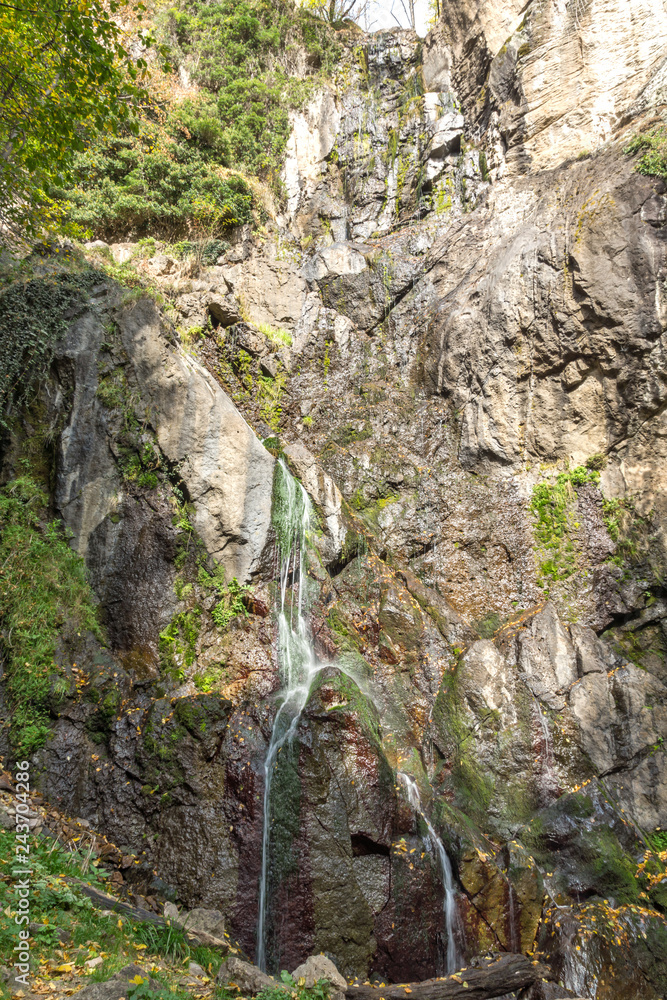 Autumn view of Samodivsko praskalo waterfall, Rhodope Mountains, Bulgaria