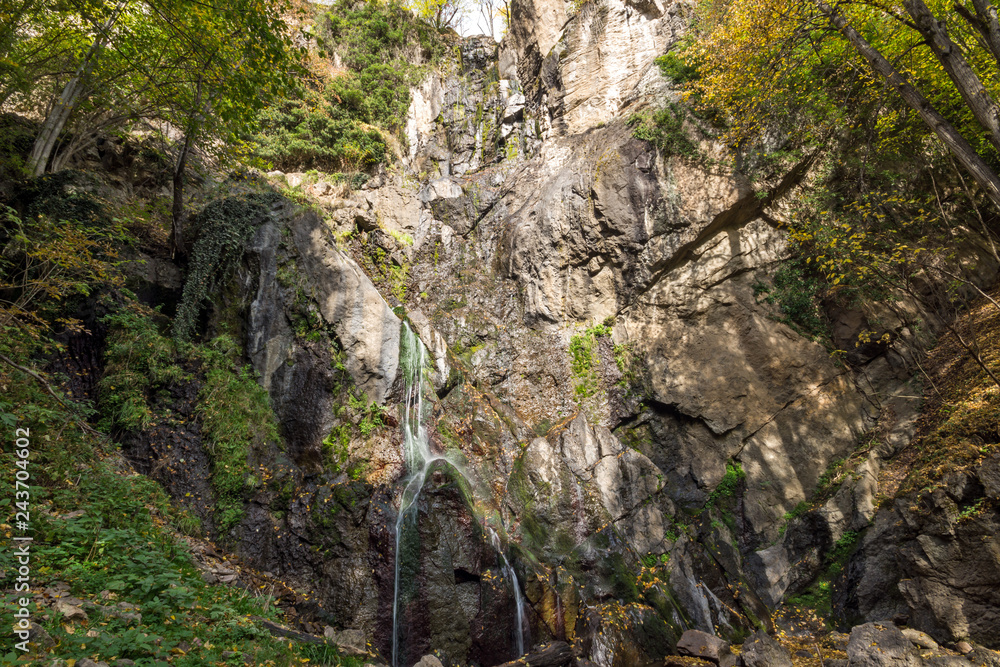Autumn view of Samodivsko praskalo waterfall, Rhodope Mountains, Bulgaria Autumn view of Samodivsko praskalo waterfall, Rhodope Mountains, Bulgaria