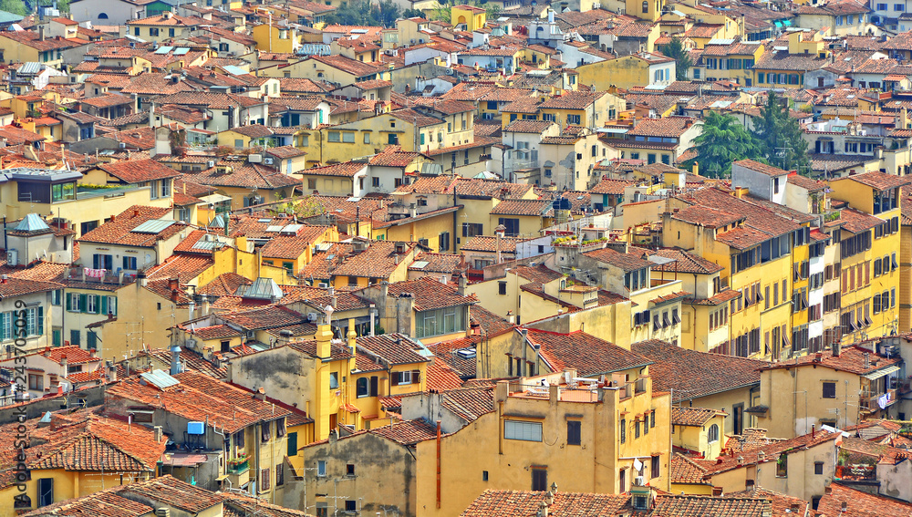 Old City. Aerial view. Plenty of densely located buildings with red tile roofs. Urban landscape.