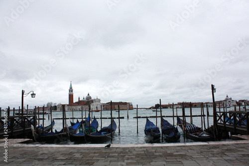 Gondolas in Venice Italy Adriatic sea. Markusdom. St Mark's Basilica Square. Saint Marco Square. © Malira