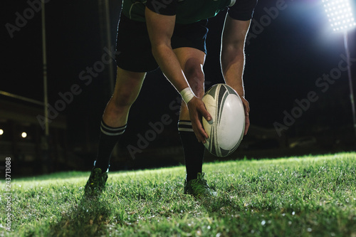Schilderij op canvas Rugby player kicking field goals