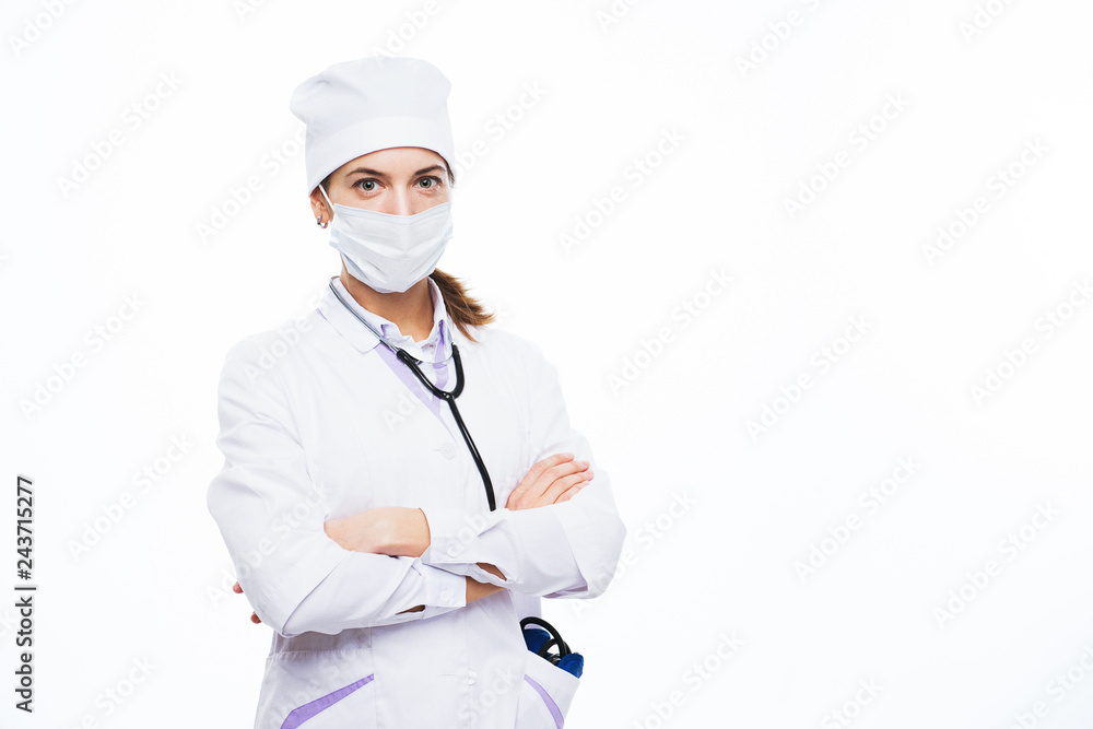 Portrait of an amiable young attractive female doctor, nurse, medical specialist in mask and white uniform. Portrait of an amiable young attractive female doctor, nurse, medical specialist in mask and white uniform.