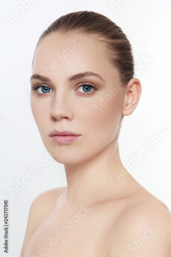 Portrait of young beautiful girl with clean make-up