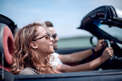 close up.couple traveling in their convertible car