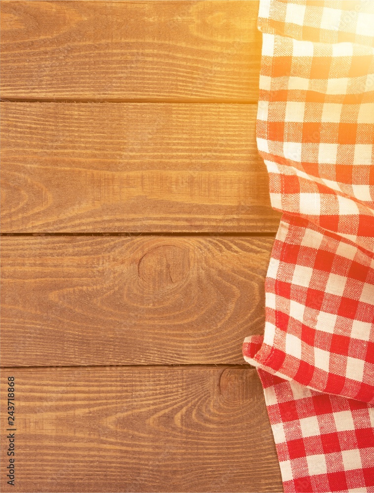 Tablecloth textile on wooden table with place for text Tablecloth textile on wooden table with place for text
