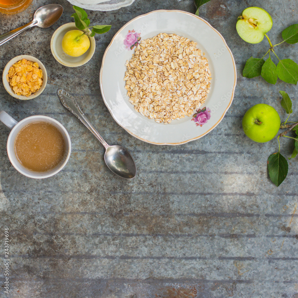 oatmeal, oat flakes, coffee for breakfast (table set). Top Food background oatmeal, oat flakes, coffee for breakfast (table set). Top Food background