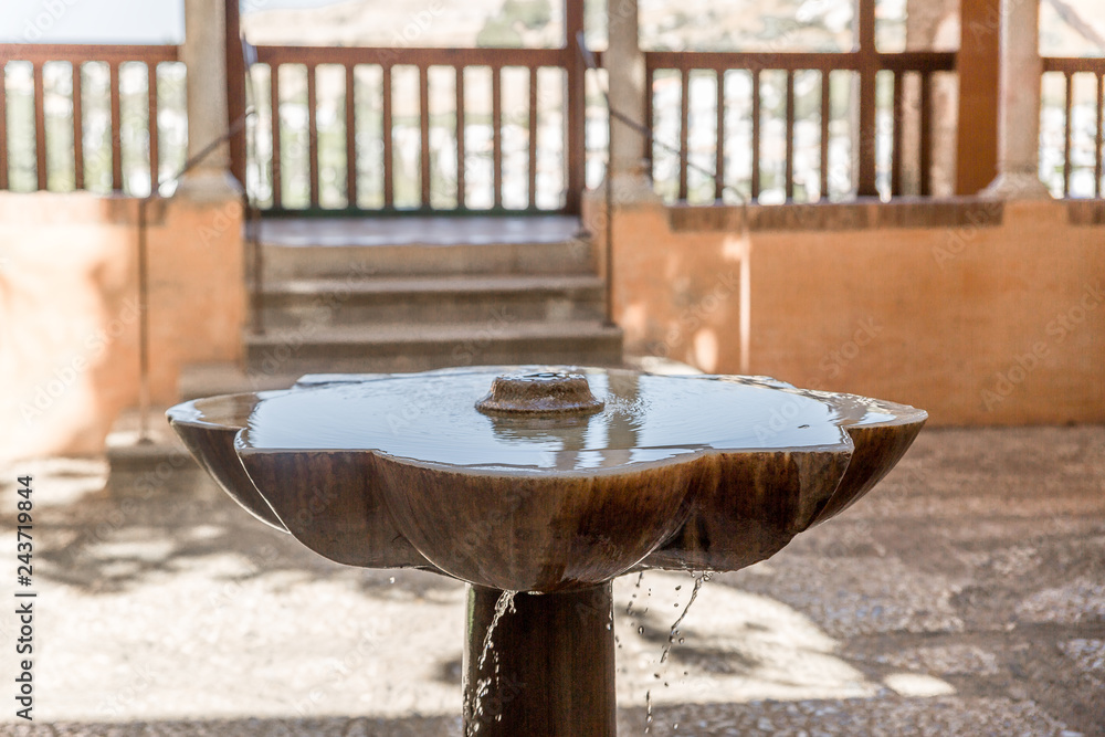Obraz premium Water fountain in one of the buildings of the Alhambra, Granada