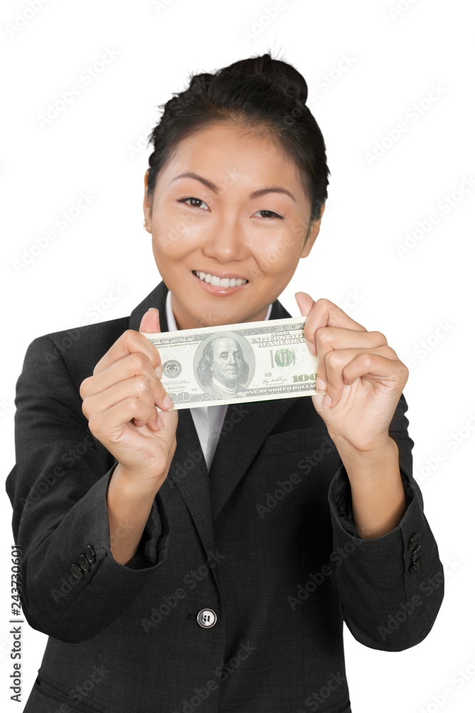 Pretty young business woman holding money isolated on white Pretty young business woman holding money isolated on white