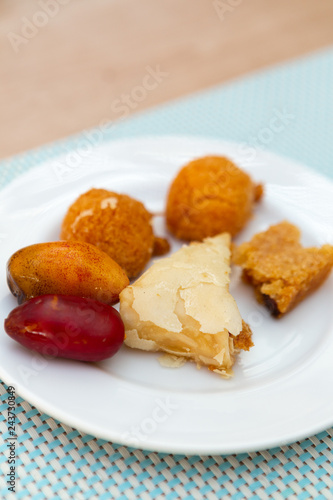 egyptian cakes and sweets and dates on the white plate