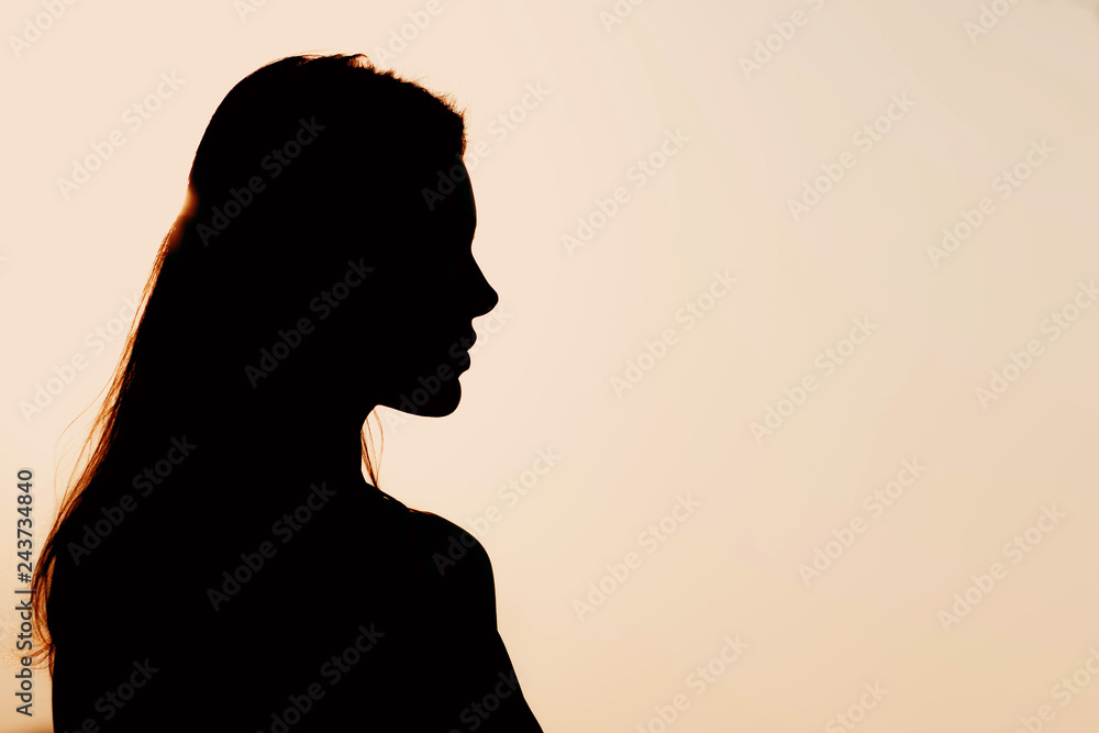 Silhouette of young beautiful woman Silhouette of young beautiful woman
