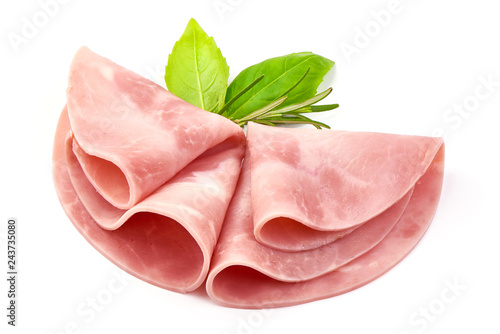 Sliced Boiled Ham with basil, close-up, isolated on a white background