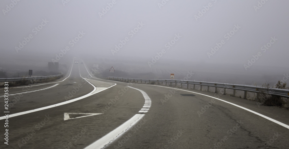Fototapeta premium Motorway highway with fog