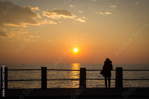 Woman watching the sunset