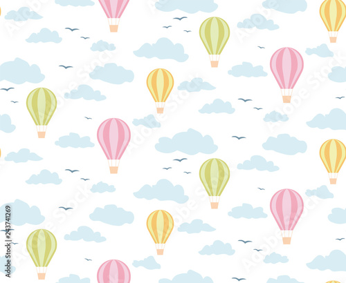 Seamless pattern balloons in the clouds, light shades.