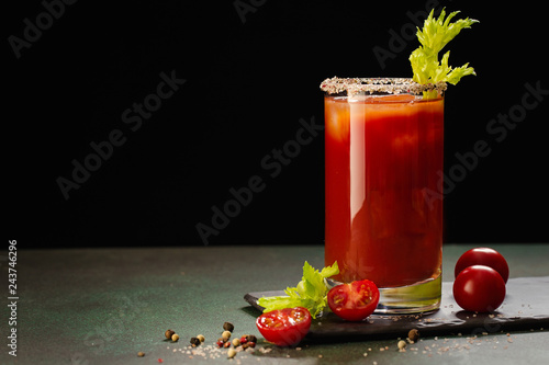 Obraz na płótnie Bloody Mary cocktail. Alcoholic drink and ingredients on dark green background, Copy space w salonie