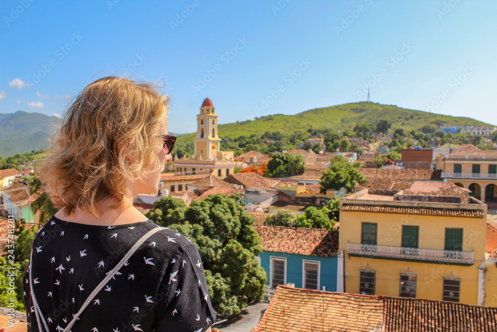 Female tourist woman enjoying the view over Trinidad, Cuba