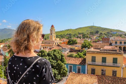 Photos Female tourist woman enjoying the view over Trinidad, Cuba