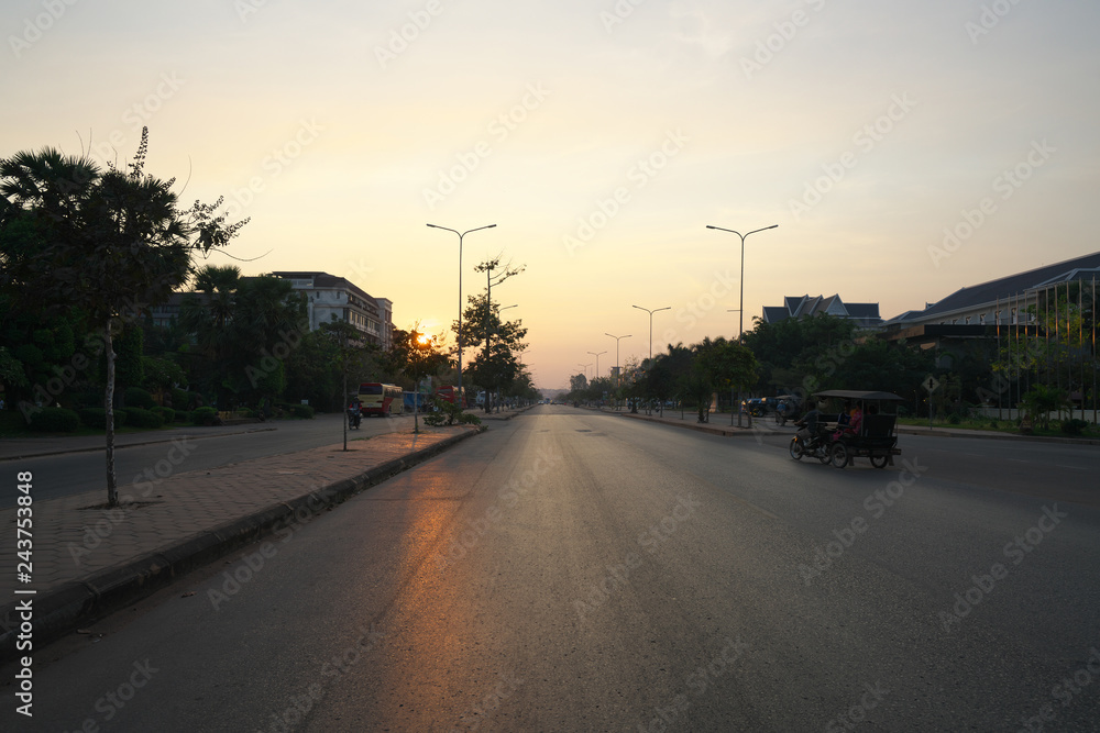 Siem Reap,Cambodia-Januay 11, 2019: Sunrise viewed from National Highway 6 in Siem Reap, Cambodia