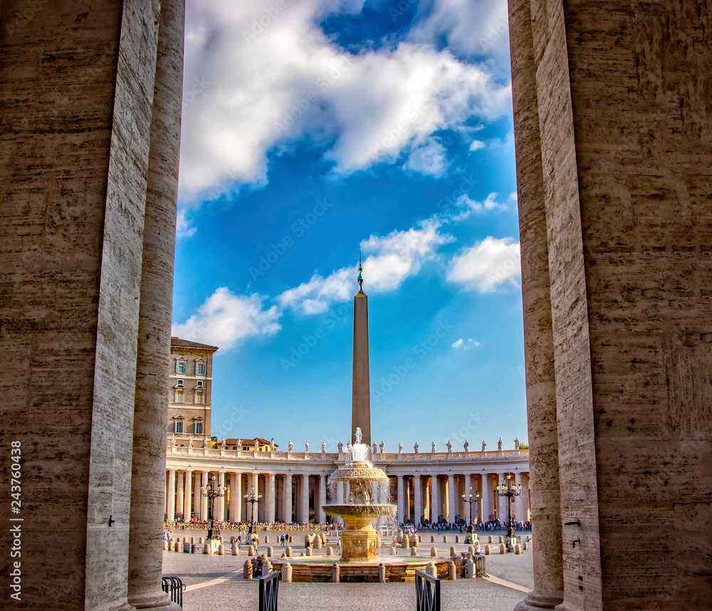 View of the fountain and pillar on the square in Vatican, Italy.