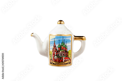 ceramic souvenir toy in the form of kettle with color painting on isolated white background reflecting the national Russian culture with the inscription in Russian: the name of the city of Yaroslavl