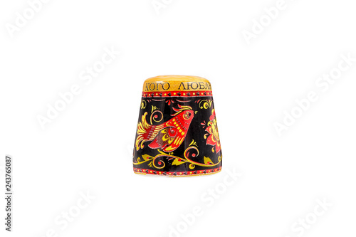 ceramic souvenir toy in the form of thimble with beautiful color painting on isolated white background reflecting the national Russian culture with the inscription in Russian: "whom I love"66