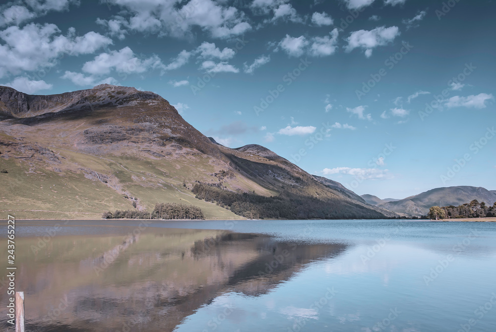 Mountain reflection in calm lake surface.Nature UK.Idyllic landscape of rural Britain.