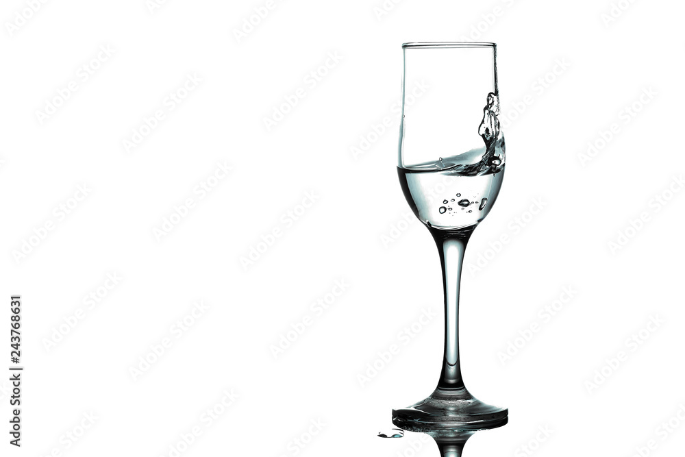 water splash and wine glass. splash alcohol in wine glass