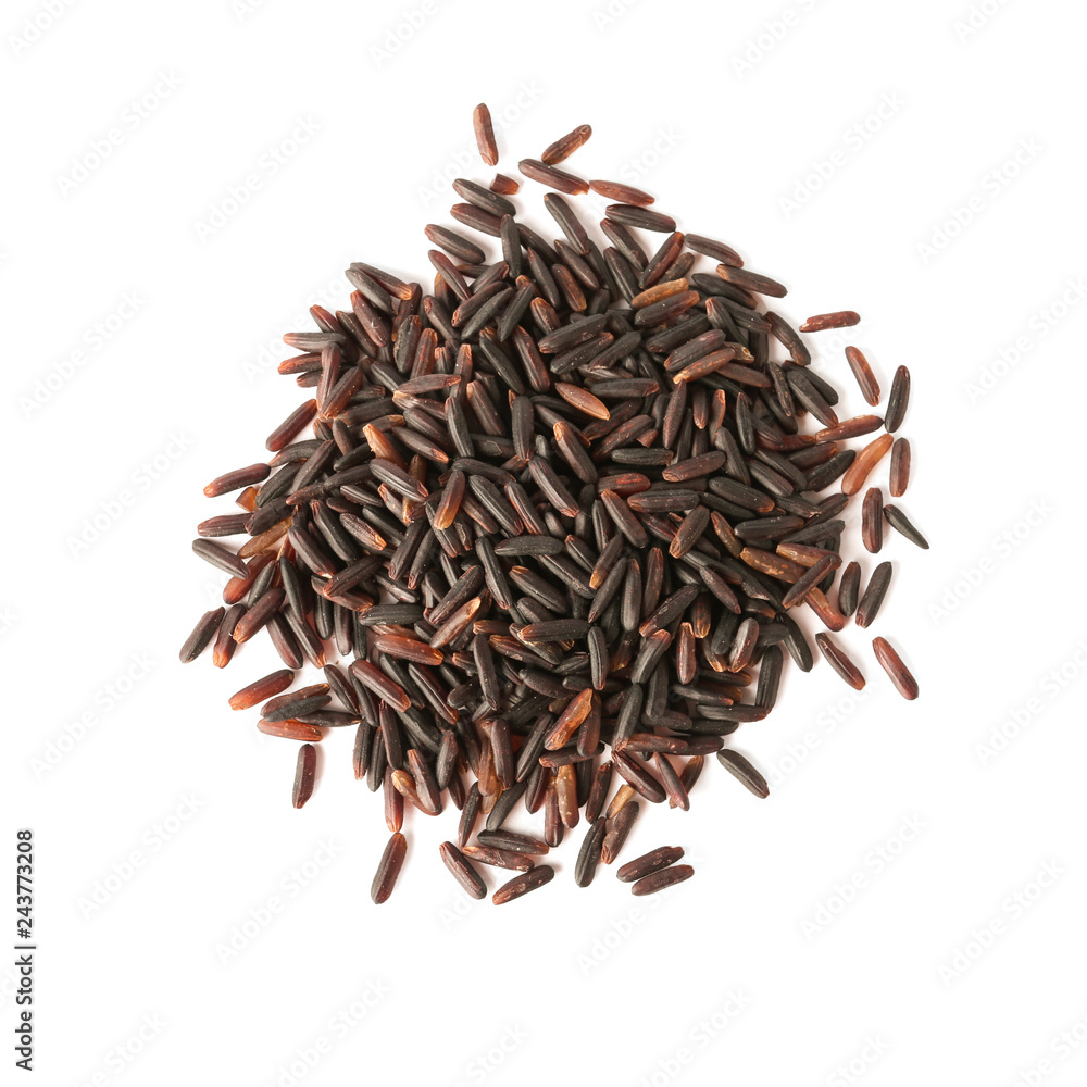 Uncooked black rice on white background, top view Uncooked black rice on white background, top view