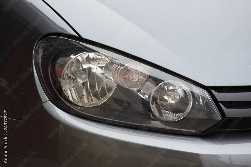 shiny headlights on a new car