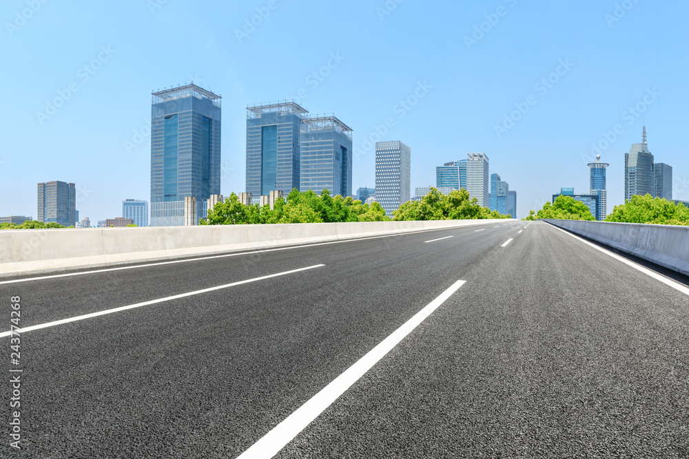 Urban road and modern commercial buildings in Shanghai