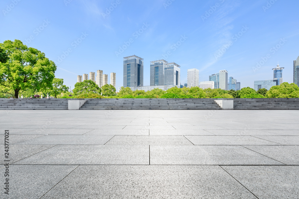 Empty square floor and modern commercial building in Shanghai Empty square floor and modern commercial building in Shanghai