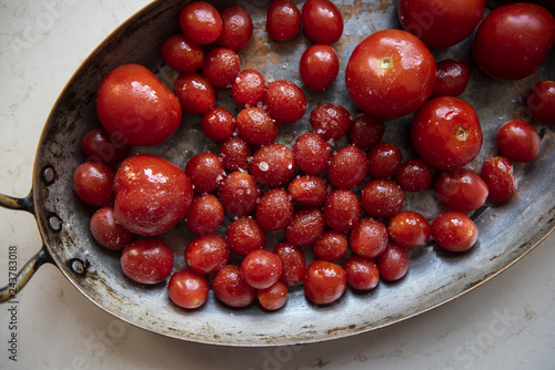 Close up of cherry tomatoes in pan photo