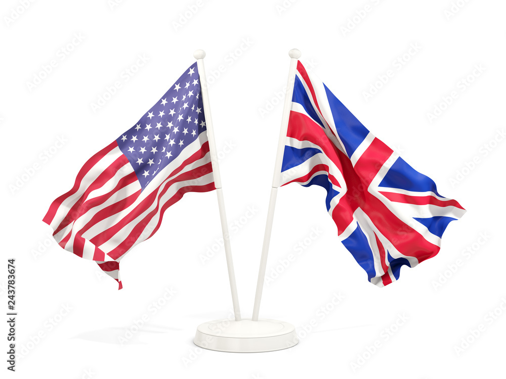 Two waving flags of United States and UK