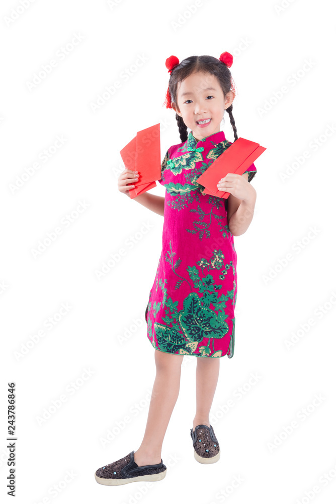 Full length of little chinese girl in red color traditional dress stand,holding red packet money and smiles isolated over white background Full length of little chinese girl in red color traditional dress stand,holding red packet money and smiles isolated over white background