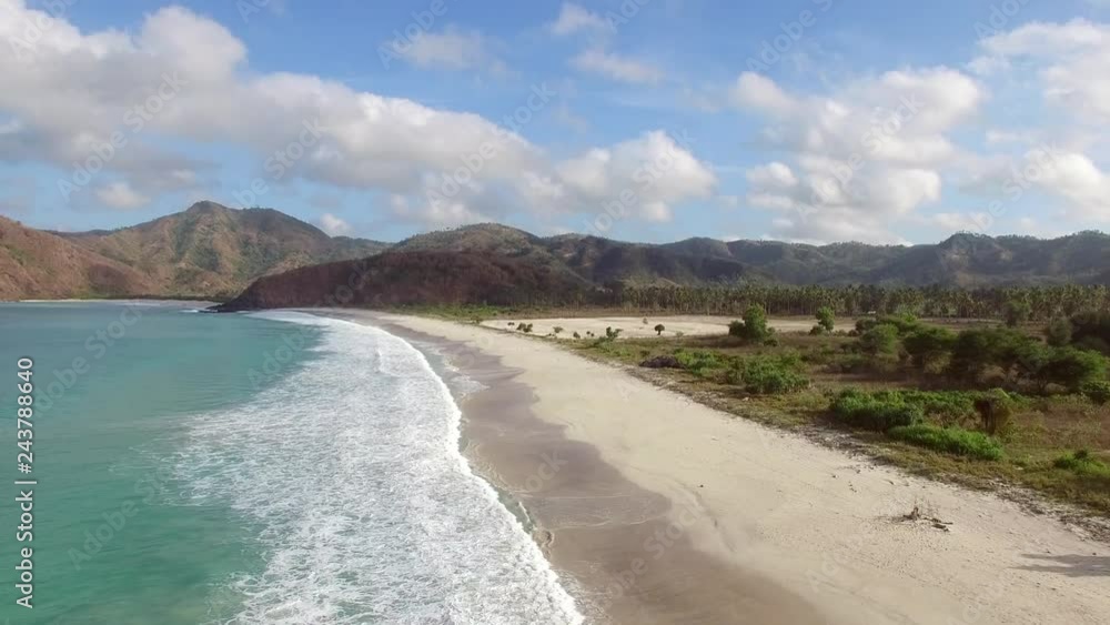 Aerial view of a tropical and isolated beach, Lombok, Indonesia. Aerial view of a tropical and isolated beach, Lombok, Indonesia.